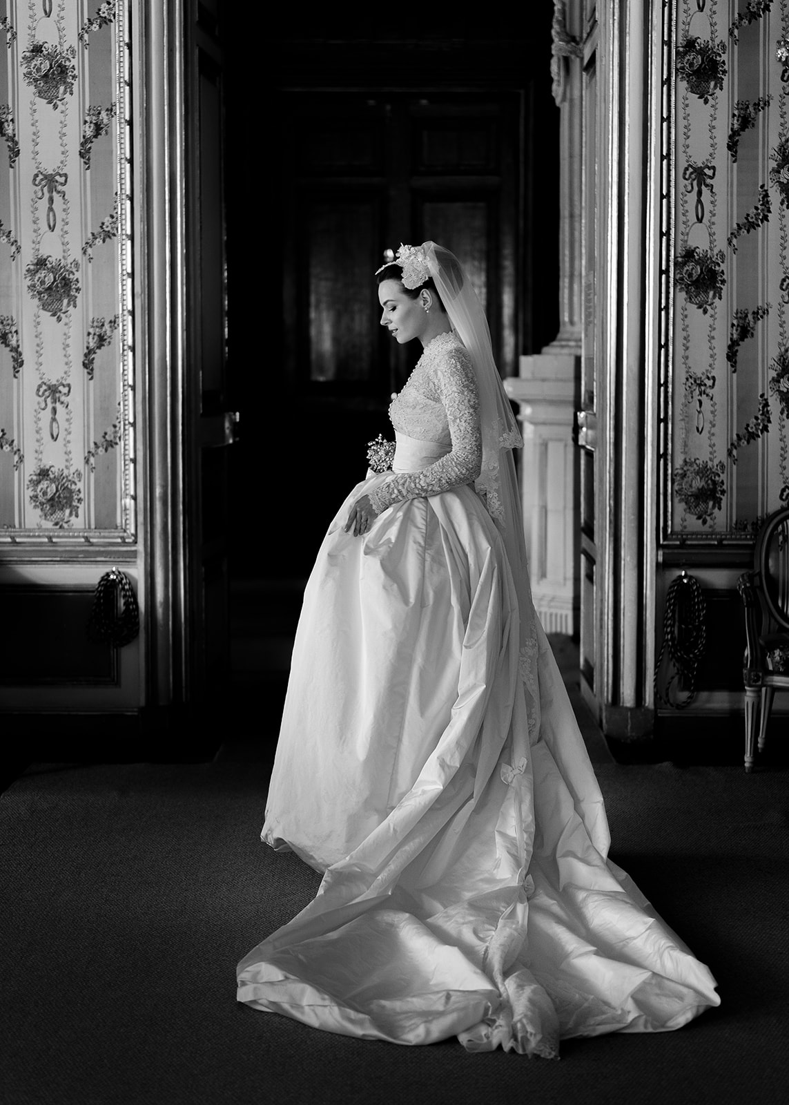black and white portrait of bride in Grace Kelly inspired gown